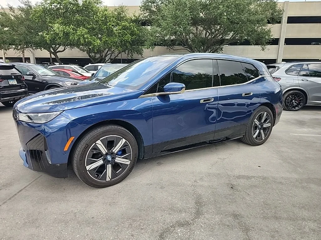Certified Used 2023 Phytonic Blue Metallic BMW xDrive50 image 1