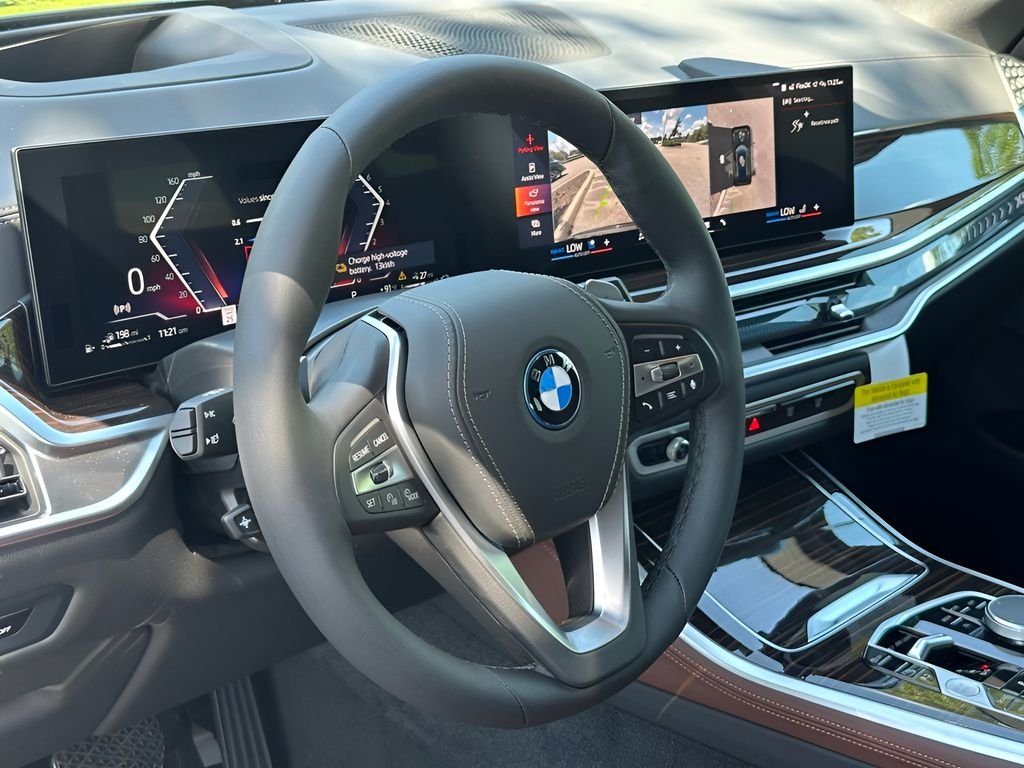New 2026 Black Sapphire Metallic BMW xDrive50e image 12