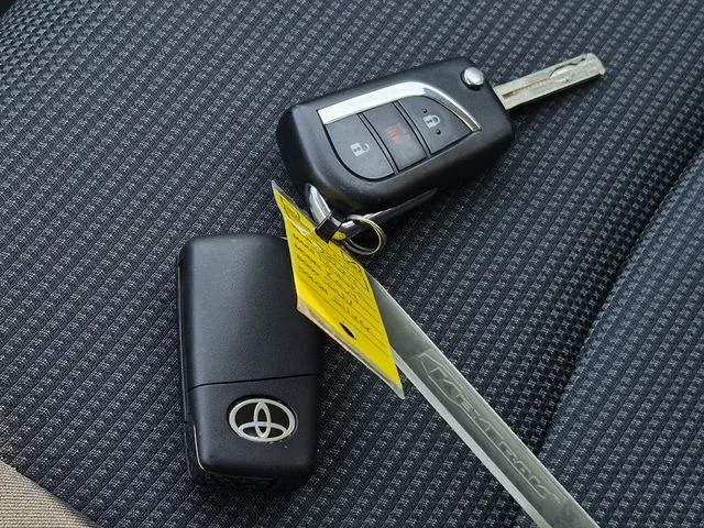 Used 2024 Silver Sky Metallic Toyota LE image 28