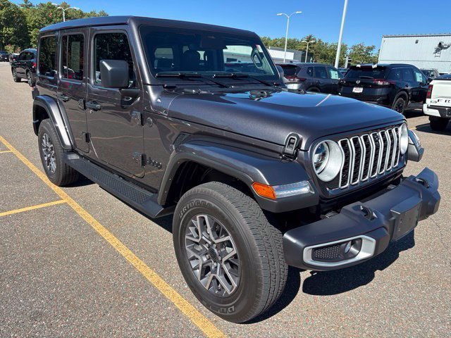 Used 2026 Granite Crystal Metallic Clearcoat Jeep Sahara image 1