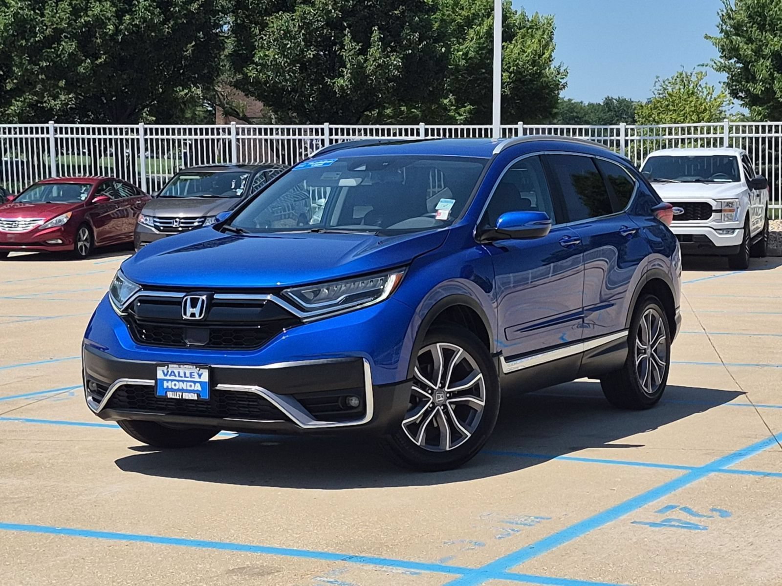 Certified Used 2022 Blue Honda Touring AWD image 2