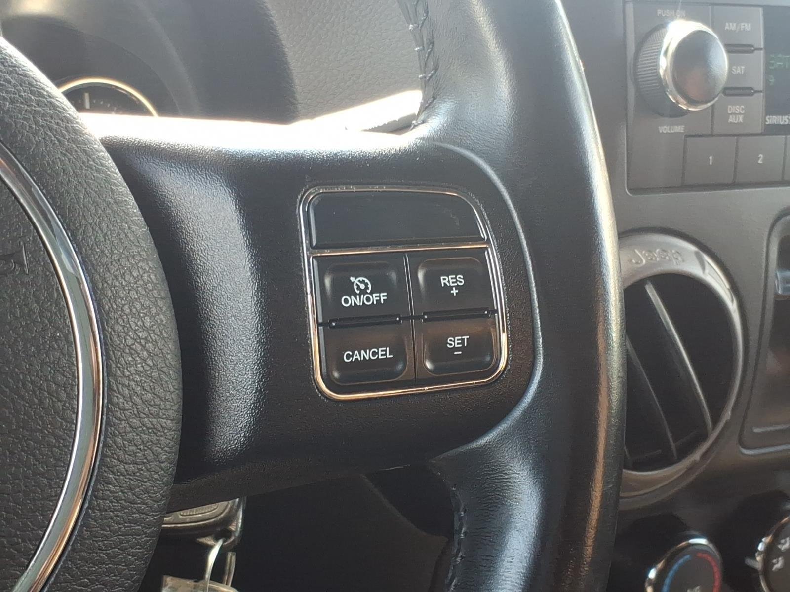 Used 2015 Billet Silver Metallic Clearcoat Jeep Sport image 26