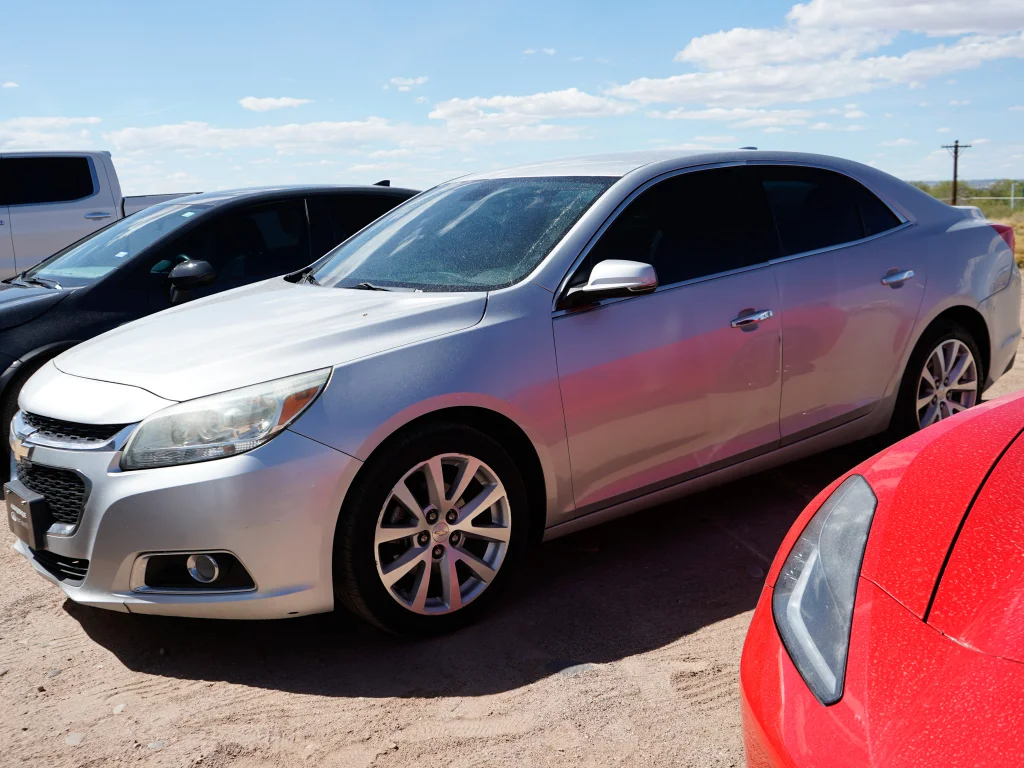 Used 2015 Silver Ice Metallic Chevrolet LTZ image 1