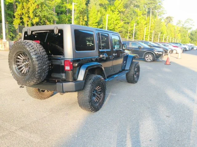 Used 2018 Black Jeep Unlimited Sahara image 6