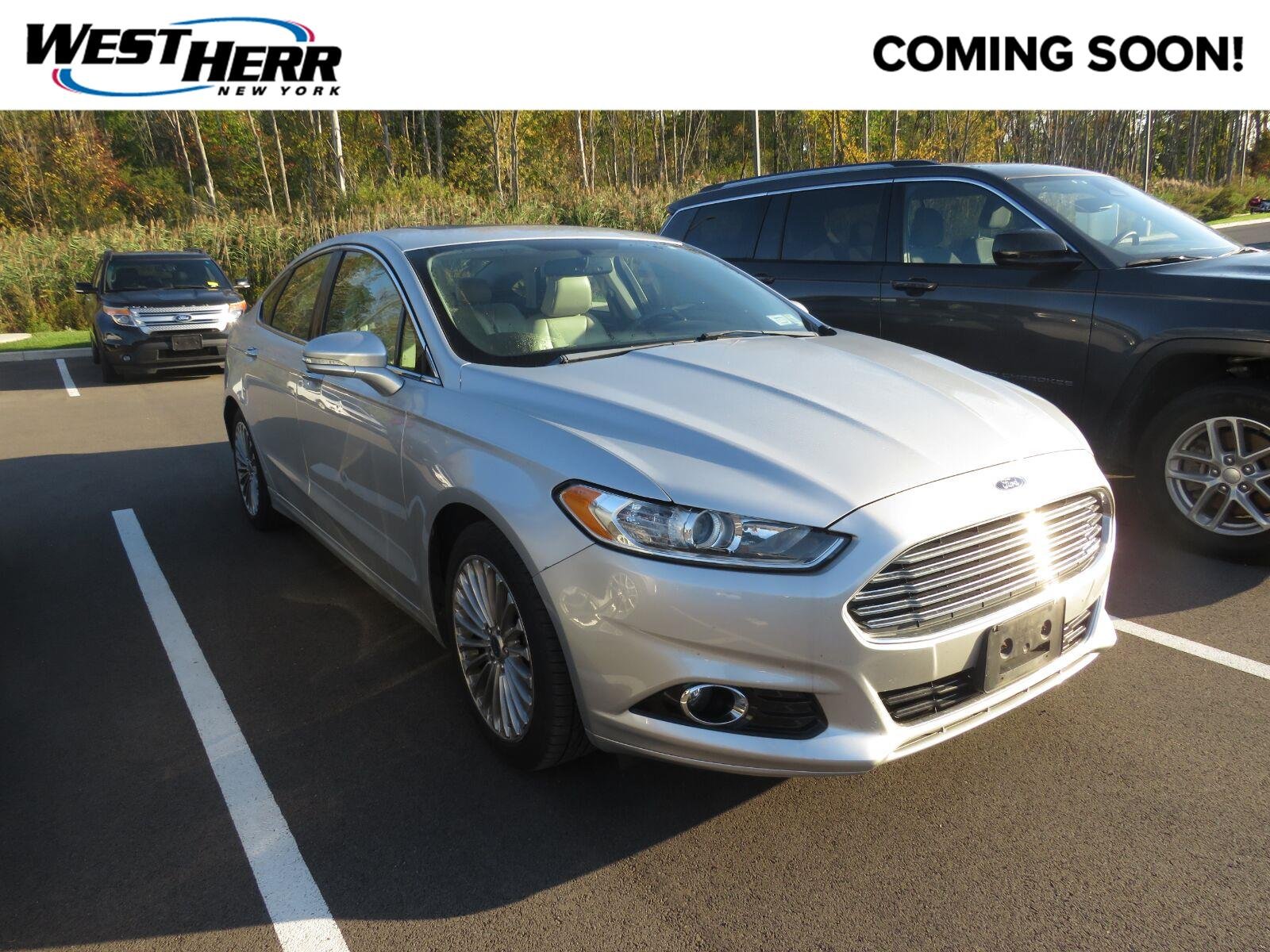 Used 2016 Ingot Silver Ford Titanium image 1
