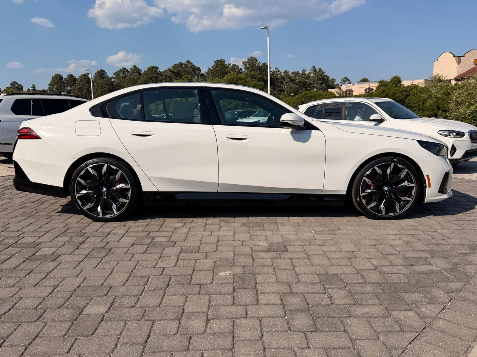 2026 BMW 5 Series 550e - Photo 8