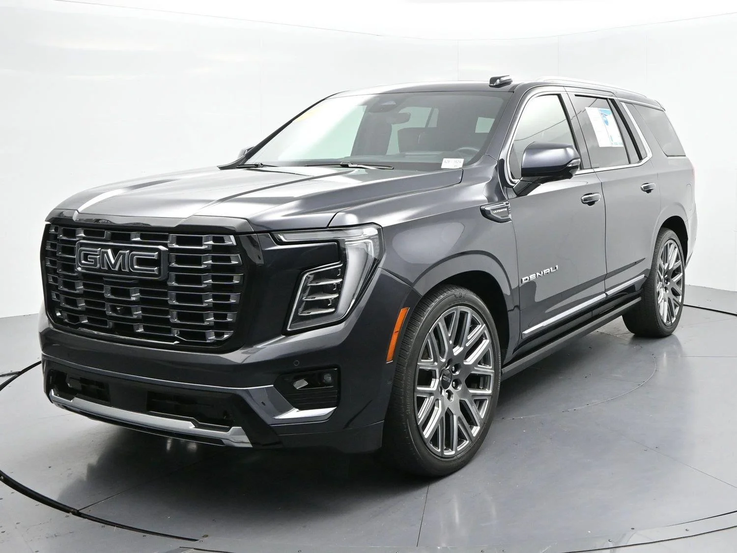 Used 2025 Titanium Rush Metallic GMC Denali Ultimate image 3