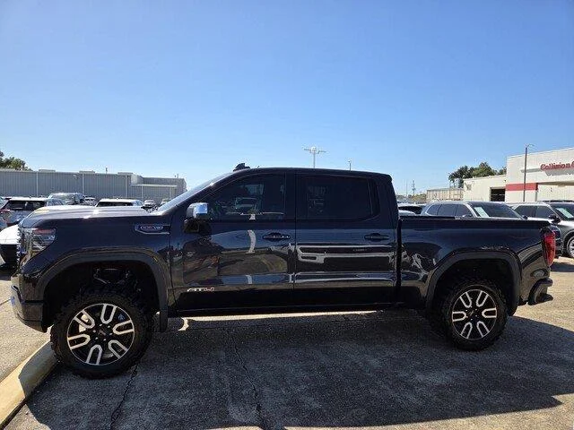 Used 2022 Titanium Rush Metallic GMC AT4 image 2