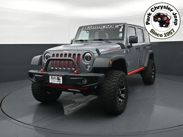 Used 2015 Jeep Wrangler Unlimited Rubicon with VIN 1C4BJWFG8FL644219 for sale in Burnsville, Minnesota