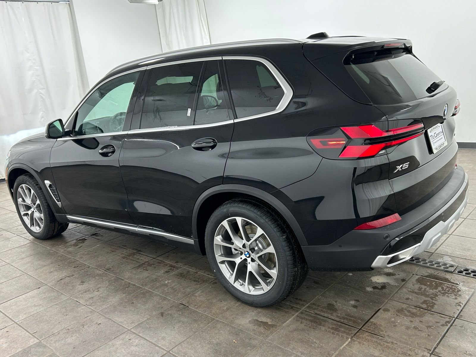New 2026 Black Sapphire Metallic BMW xDrive40i image 3