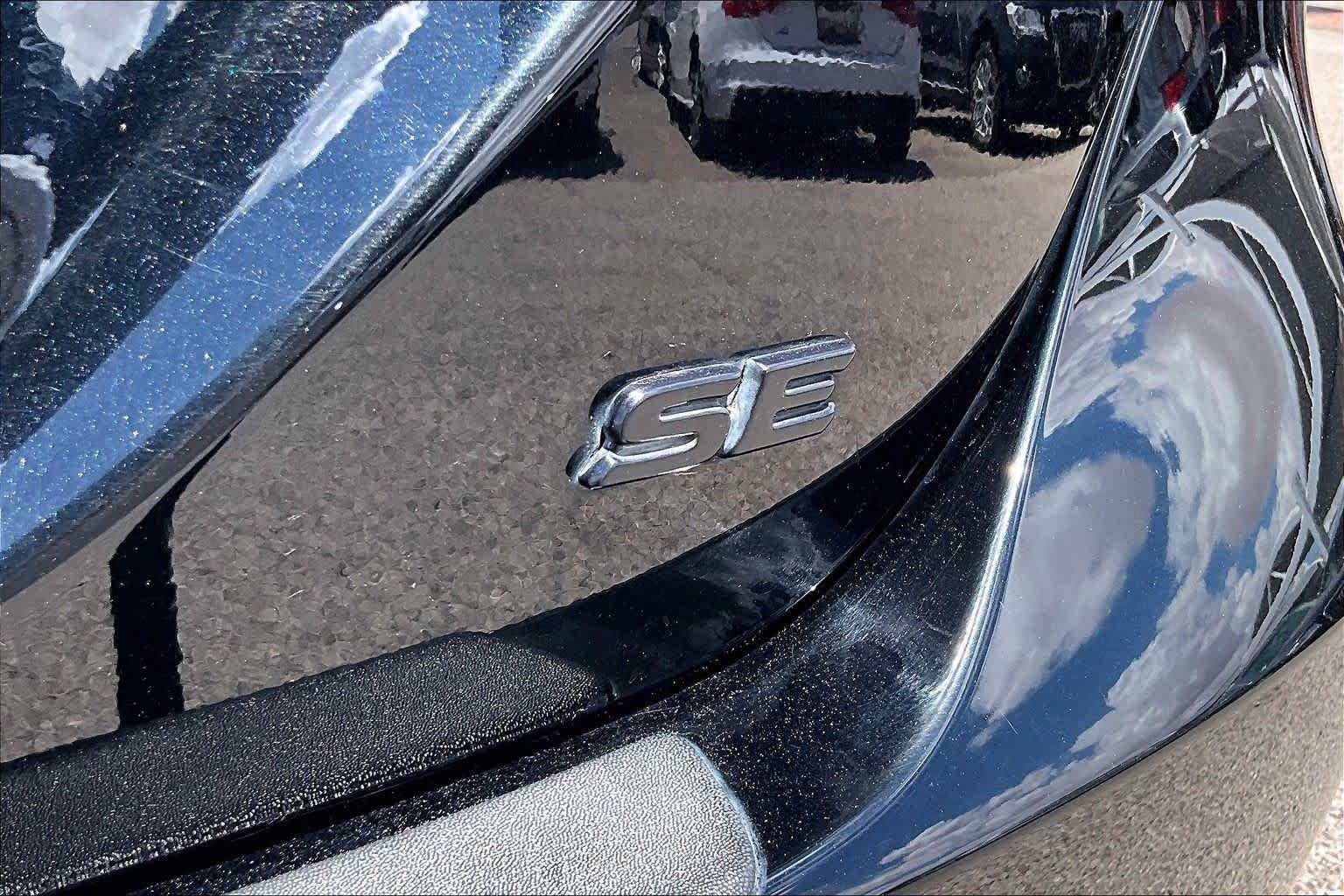 Used 2022 Midnight Black Metallic Toyota SE image 9