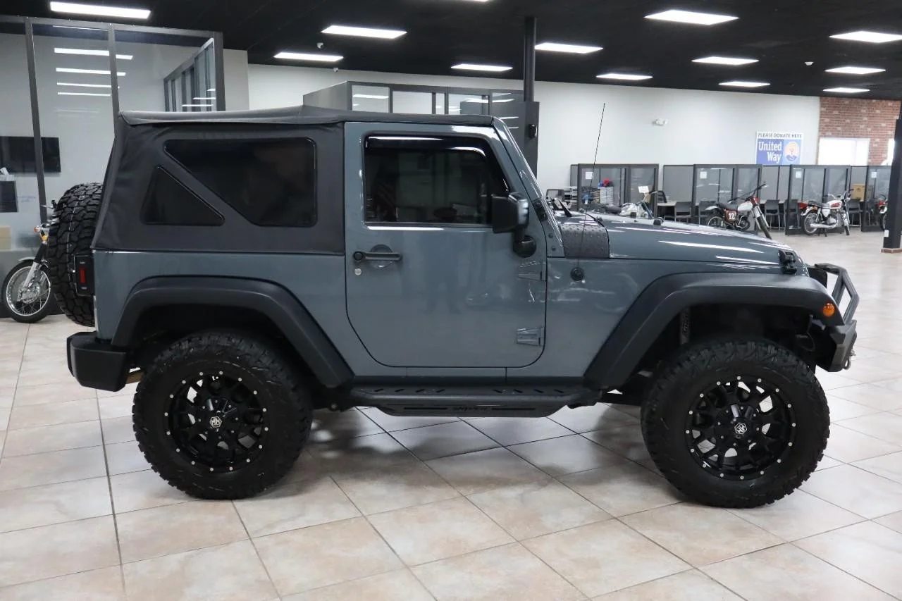 Used 2015 Hydro Blue Pearl Coat Jeep Sport image 3