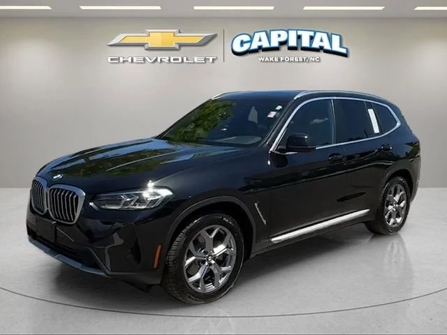 Used 2024 Black BMW xDrive30i image 1