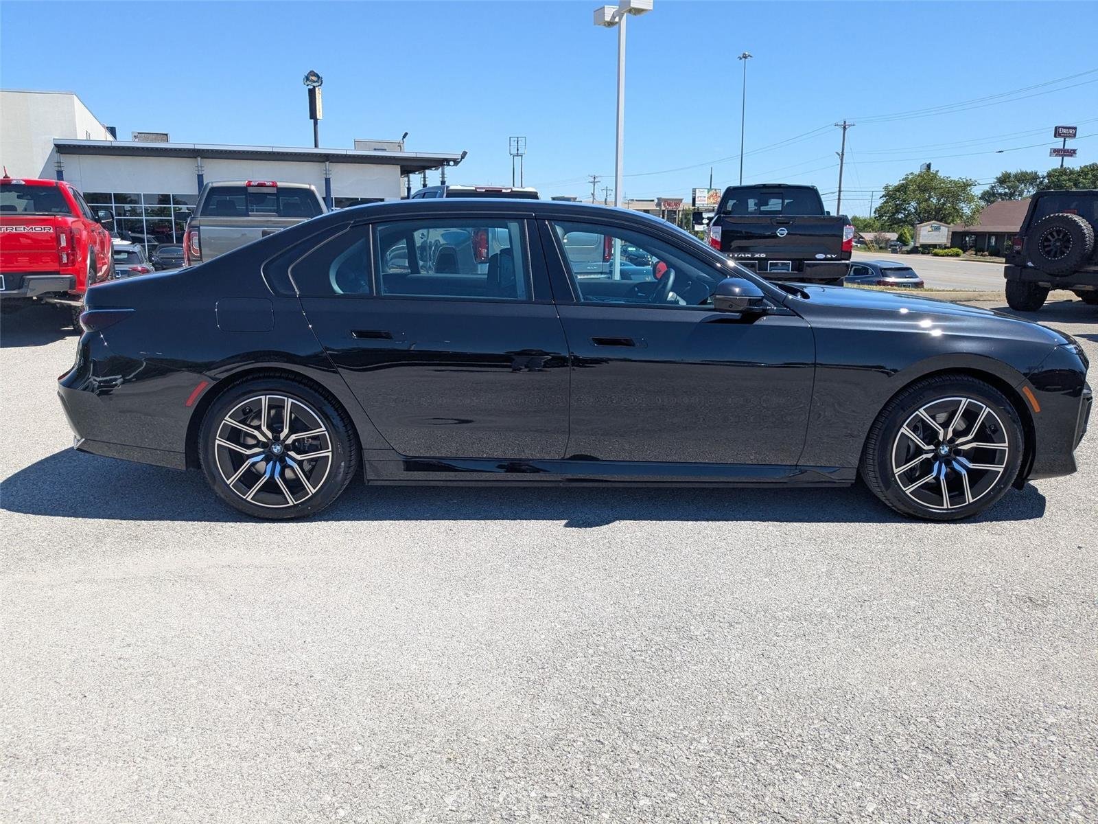 Used 2025 Black Sapphire Metallic BMW eDrive50 image 4