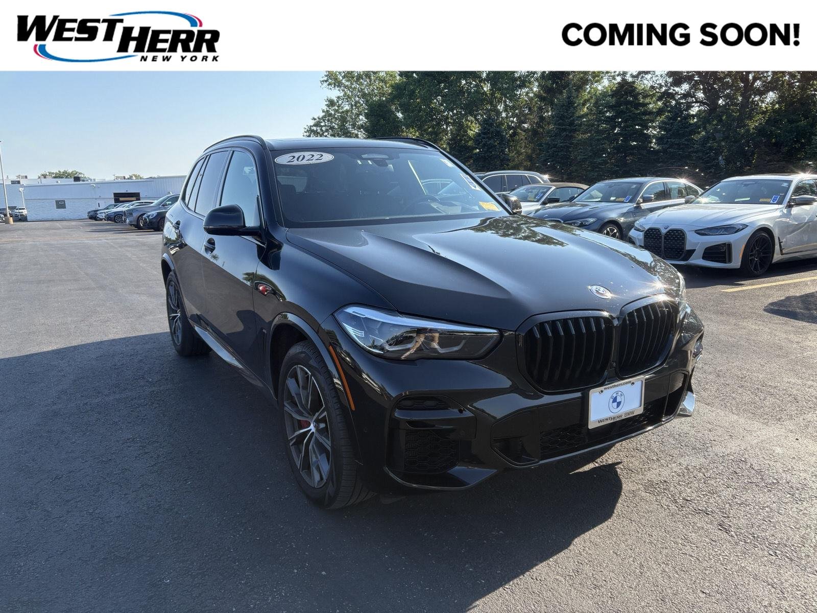 Used 2022 Black Sapphire Metallic BMW M50i image 1