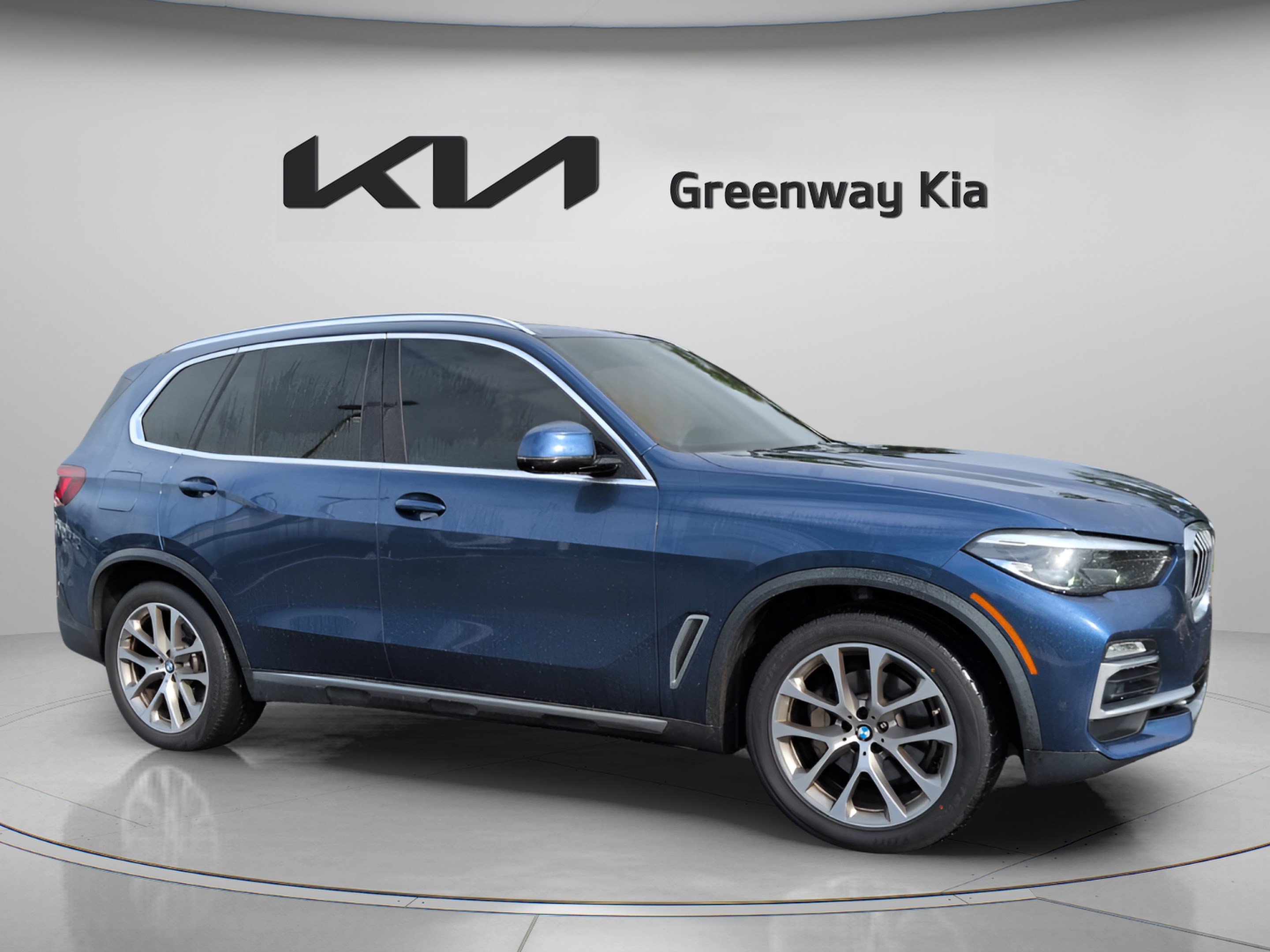 Used 2021 Phytonic Blue Metallic BMW sDrive40i image 1