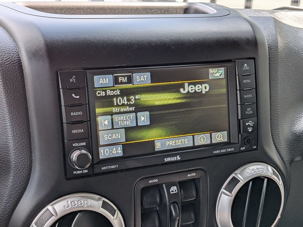 Used 2016 Black Jeep Unlimited Sahara image 16