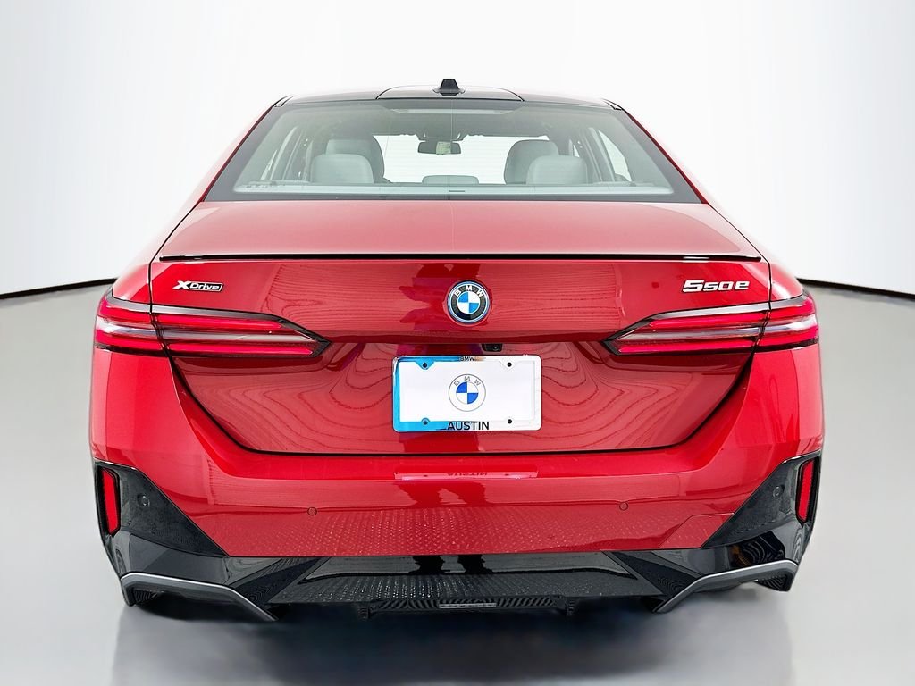 New 2027 Vegas Red Metallic BMW 550e xDrive image 6