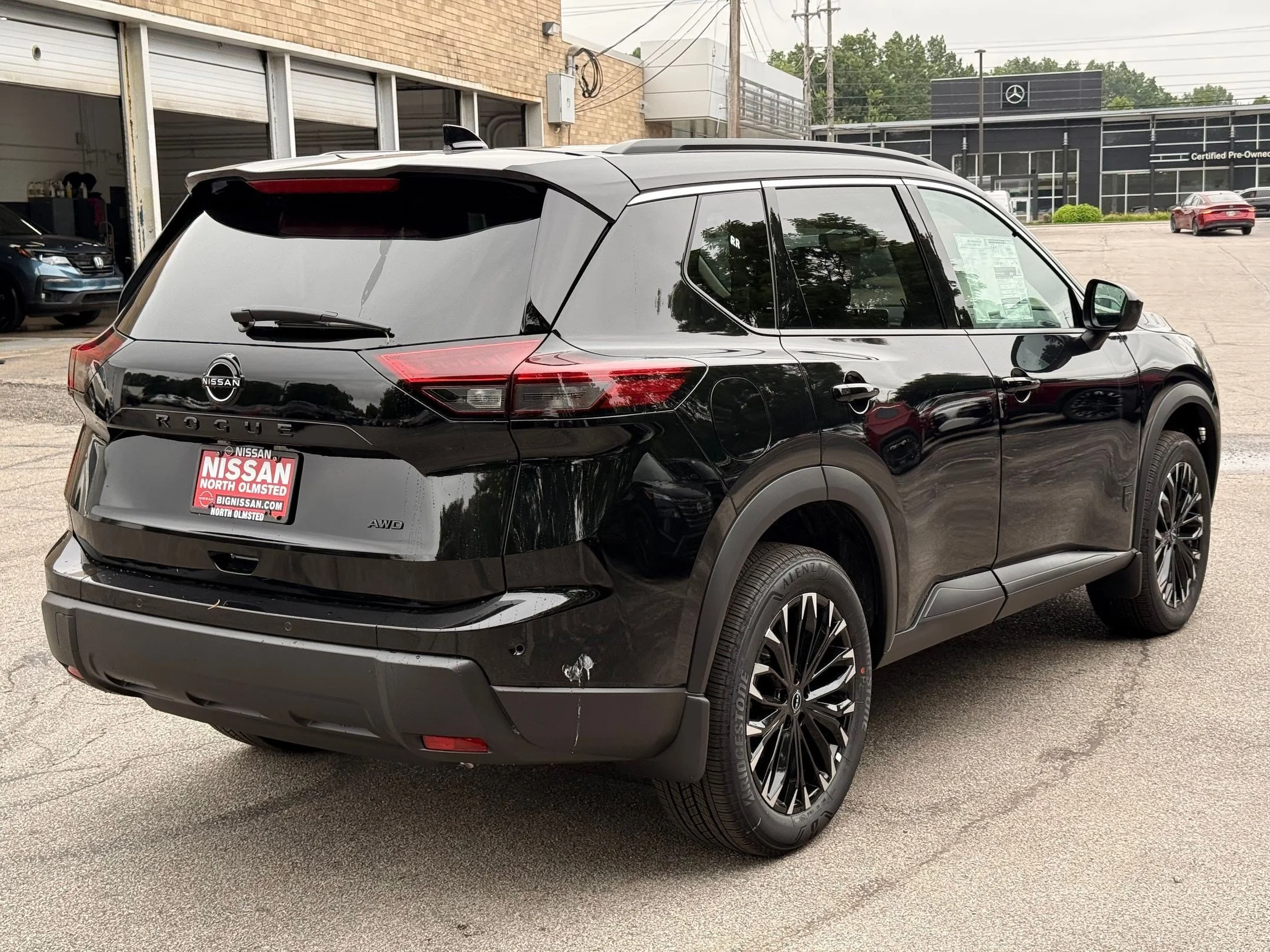 New 2026 Super Black Nissan Dark Armor image 2