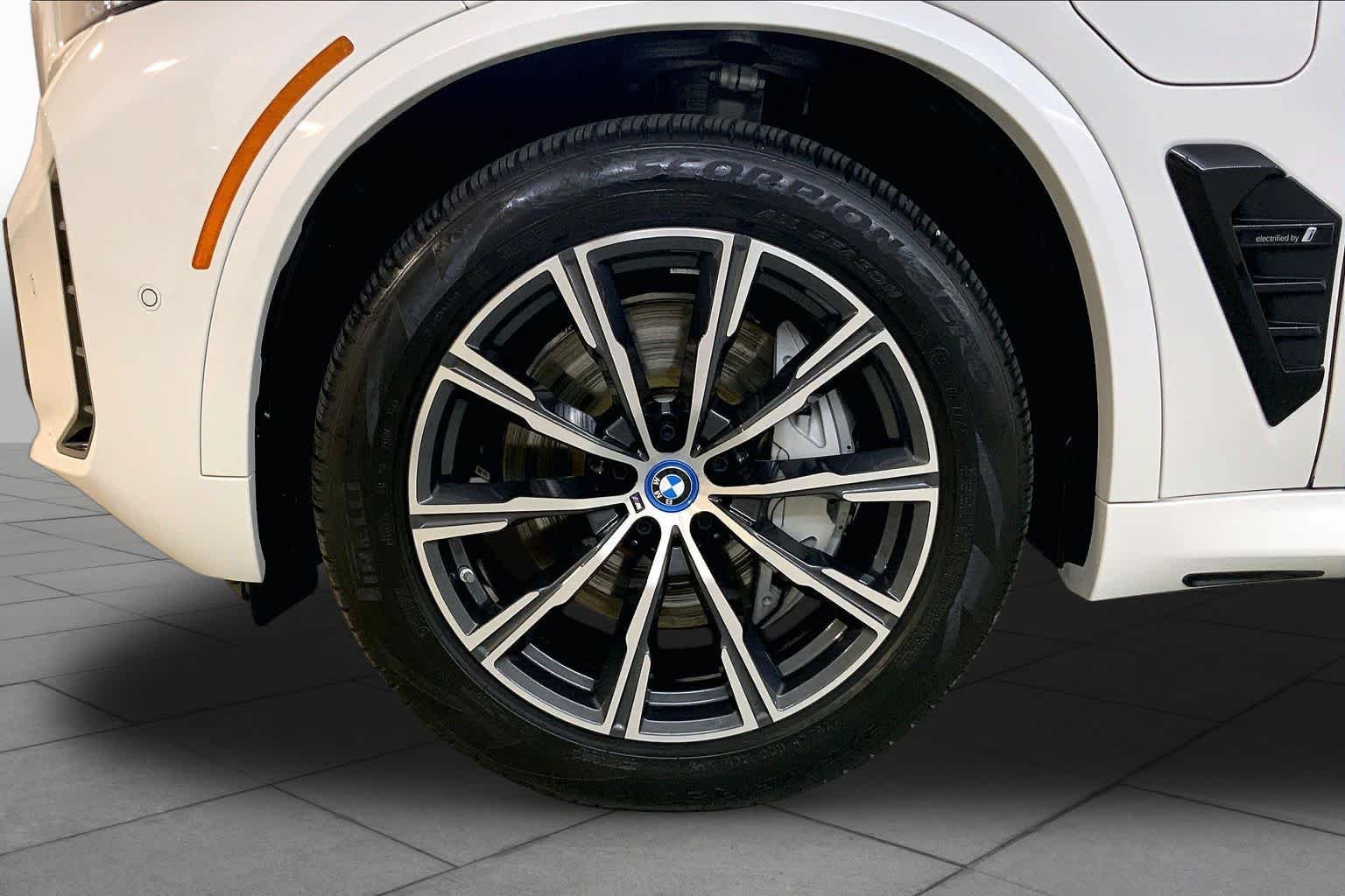 Used 2024 Mineral White Metallic BMW xDrive50e image 10