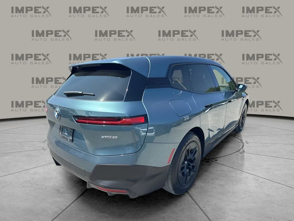 Used 2023 Blue BMW xDrive50 image 5