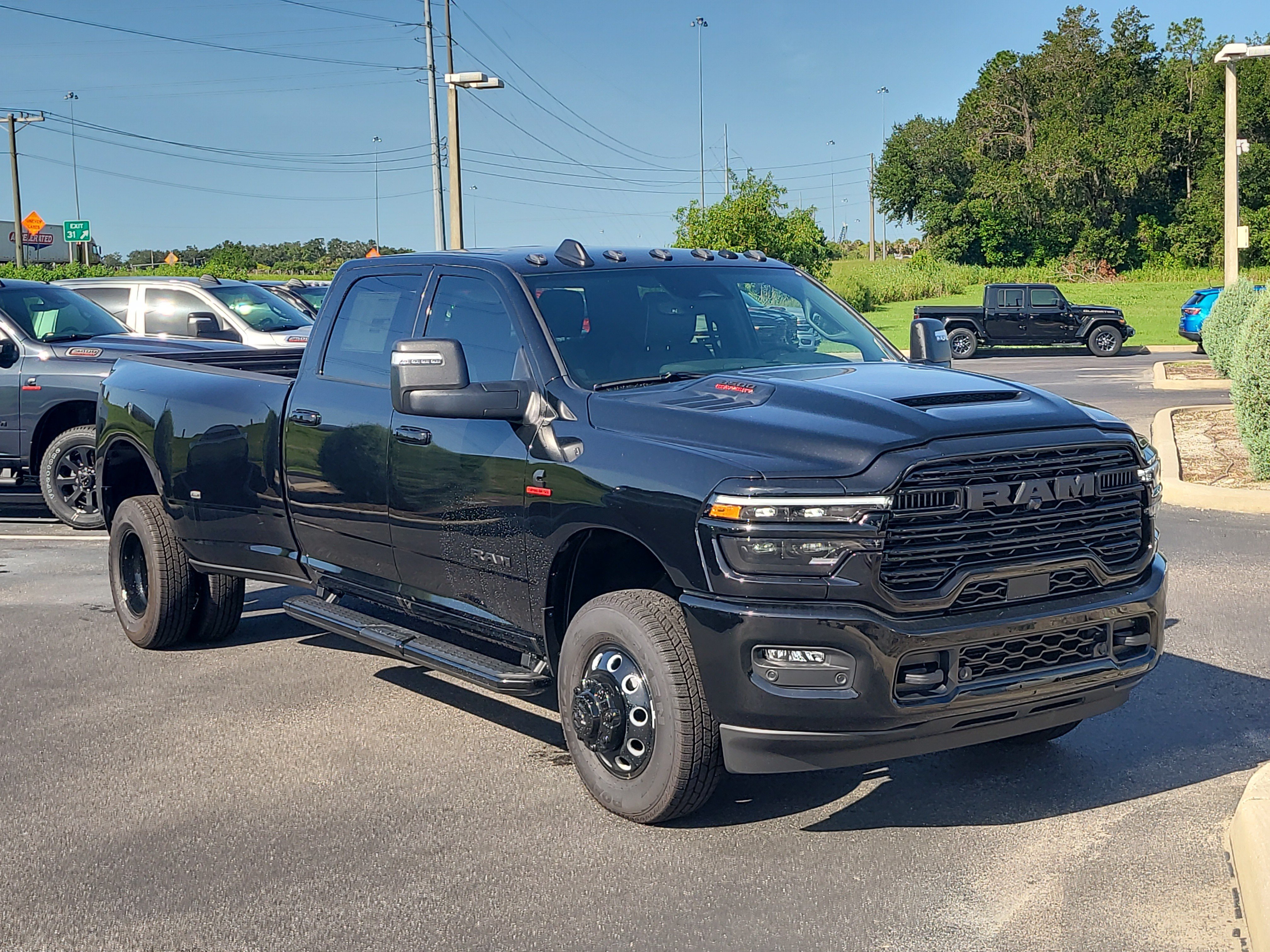 New 2026 Diamond Black Crystal Pearl-Coat Exterior Paint RAM Laramie image 2