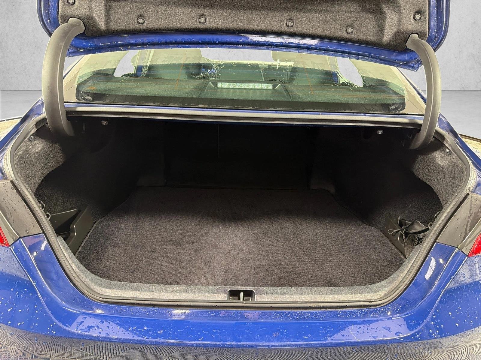Used 2024 Reservoir Blue Toyota LE image 18