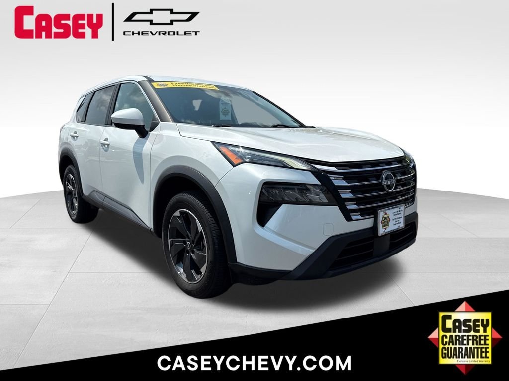 Used 2024 White Pearl Nissan SV image 1