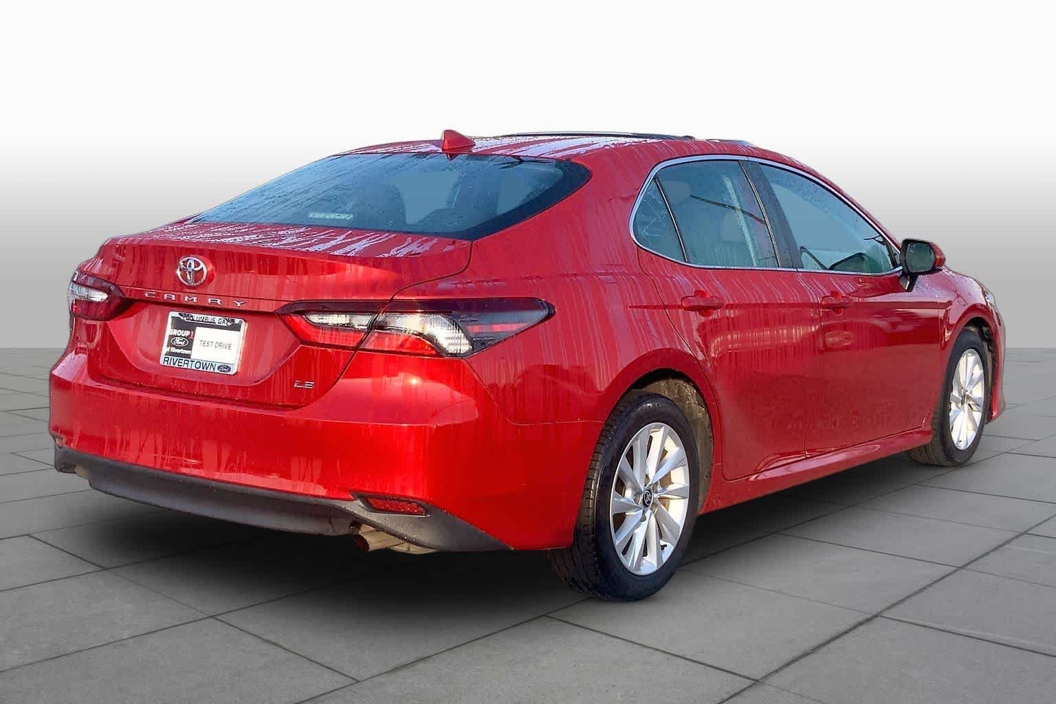 Used 2024 Supersonic Red Toyota LE image 12