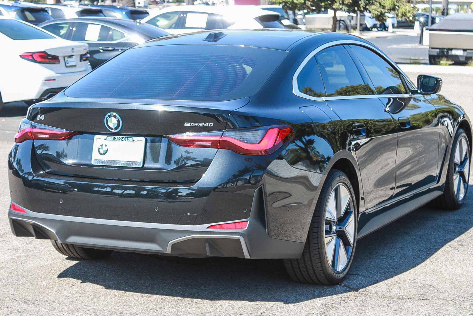 Used 2023 Black Sapphire Metallic BMW eDrive40 image 6