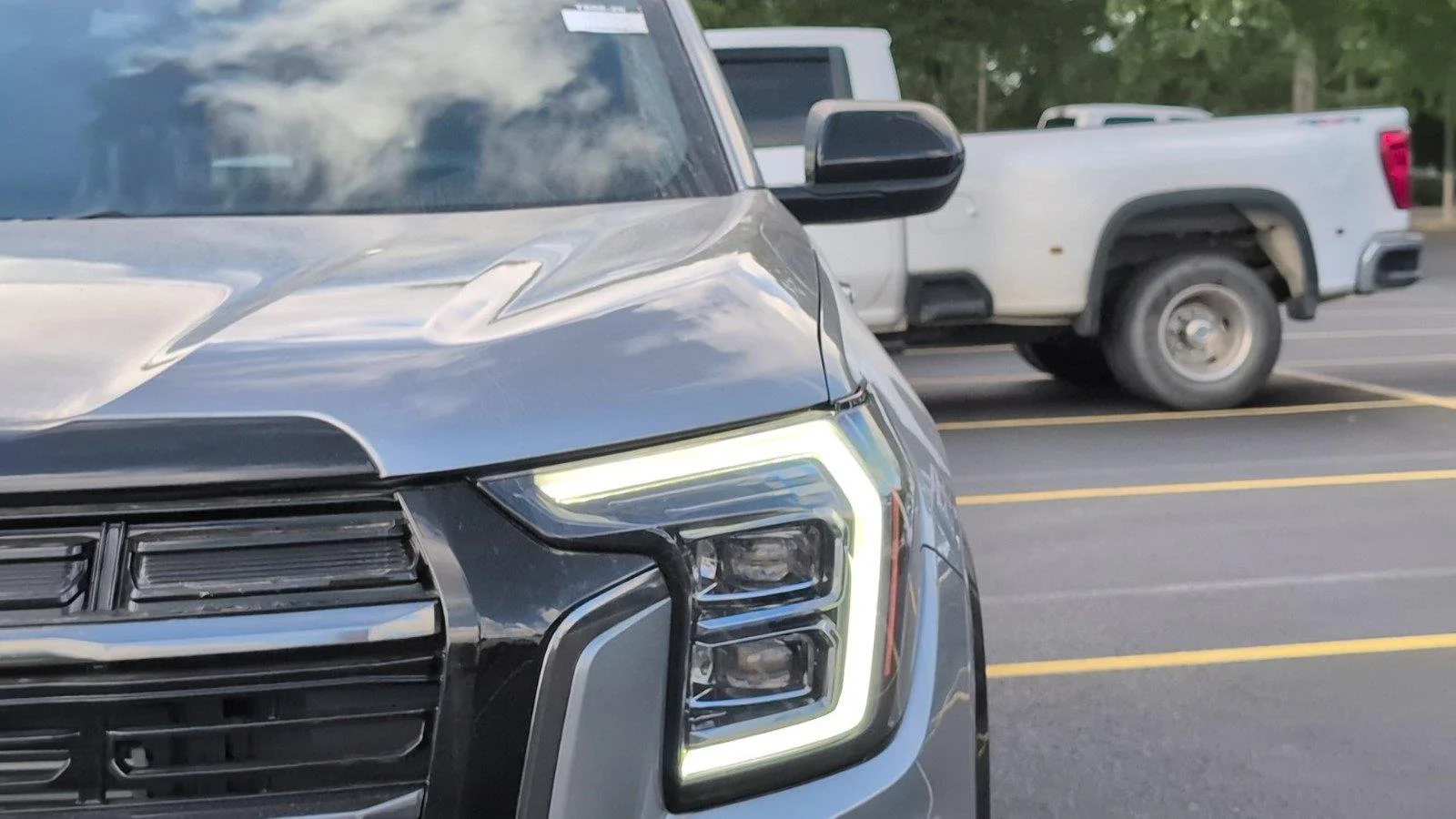 New 2026 Sterling Metallic GMC AT4 image 12