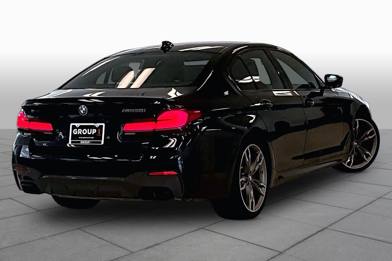 Used 2023 Carbon Black Metallic BMW M550i xDrive image 12