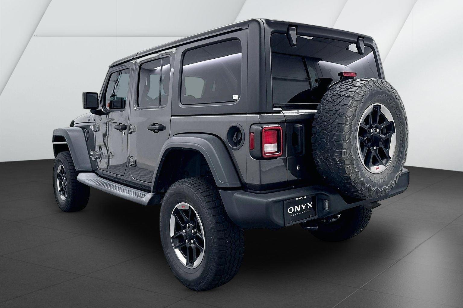 Used 2018 Granite Crystal Metallic Clearcoat Jeep Sport image 9
