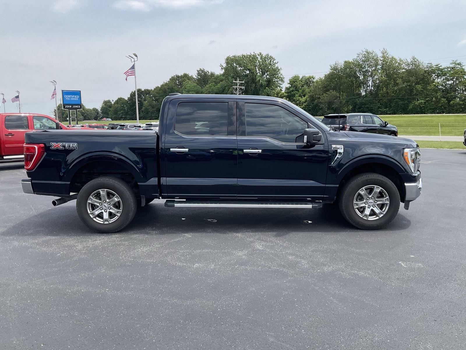 Used 2023 Antimatter Blue FORD XLT 4WD SUPERCREW 5.5