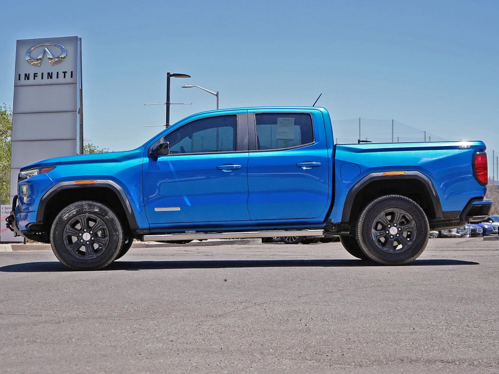 Used 2023 Dynamic Blue Metallic GMC 4WD Elevation image 4