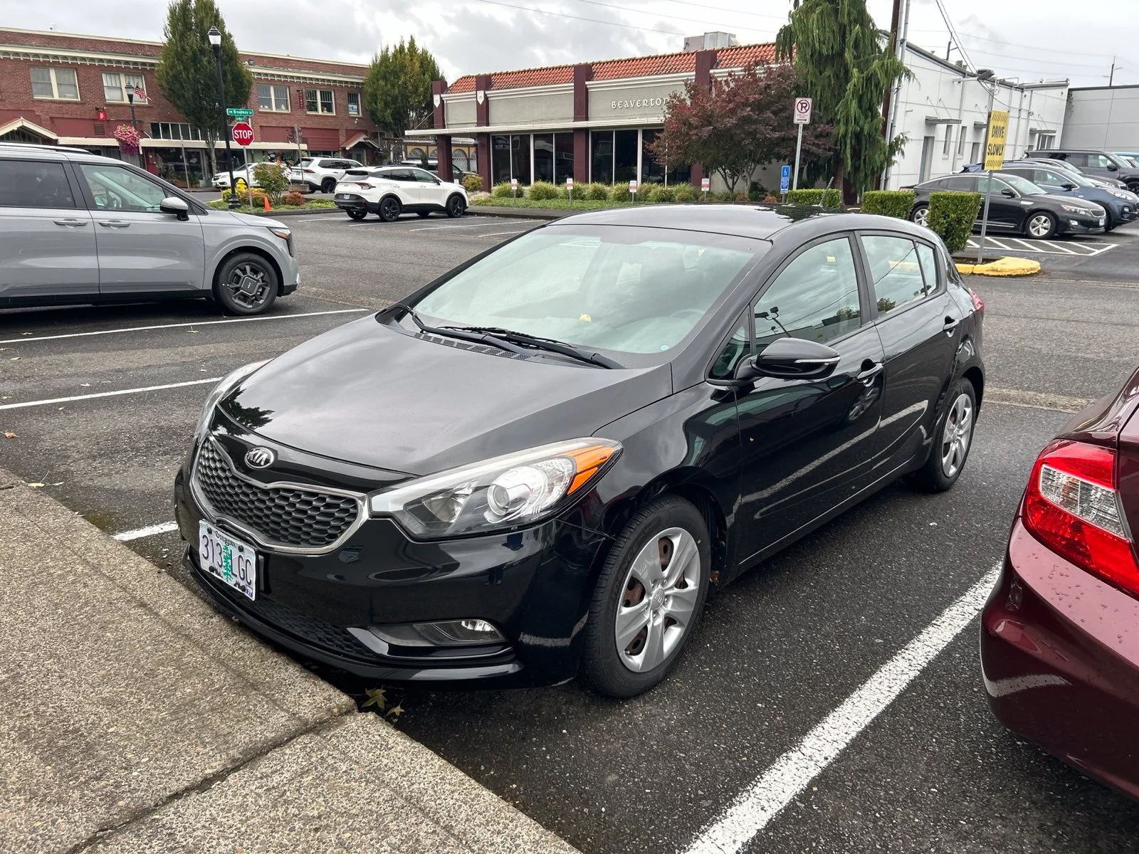 Used 2016 Aurora Black Kia LX image 1