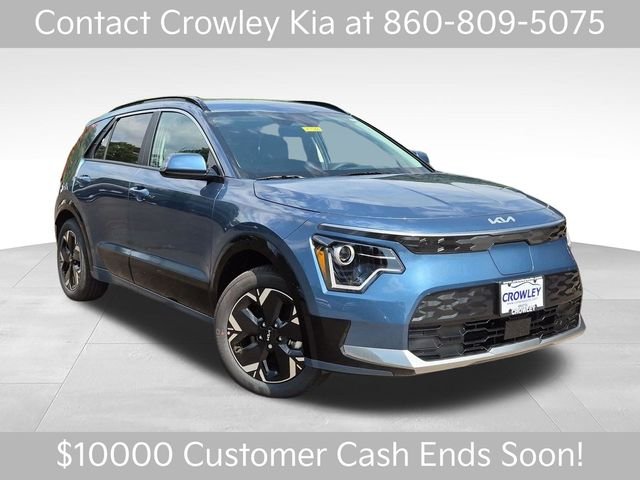 New 2026 Mineral Blue Kia WIND image 1