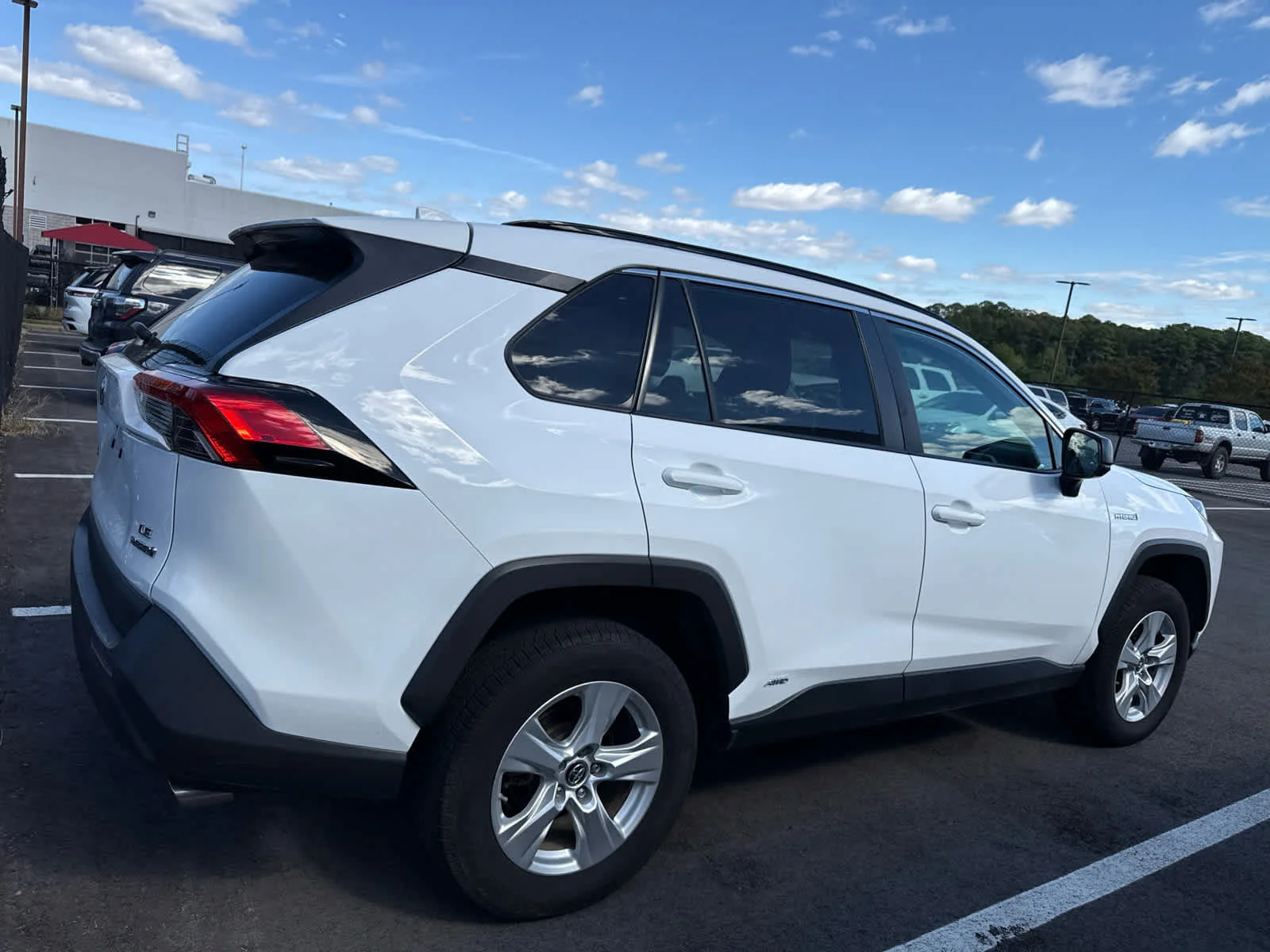 Used 2021 Super White Toyota Hybrid LE image 3