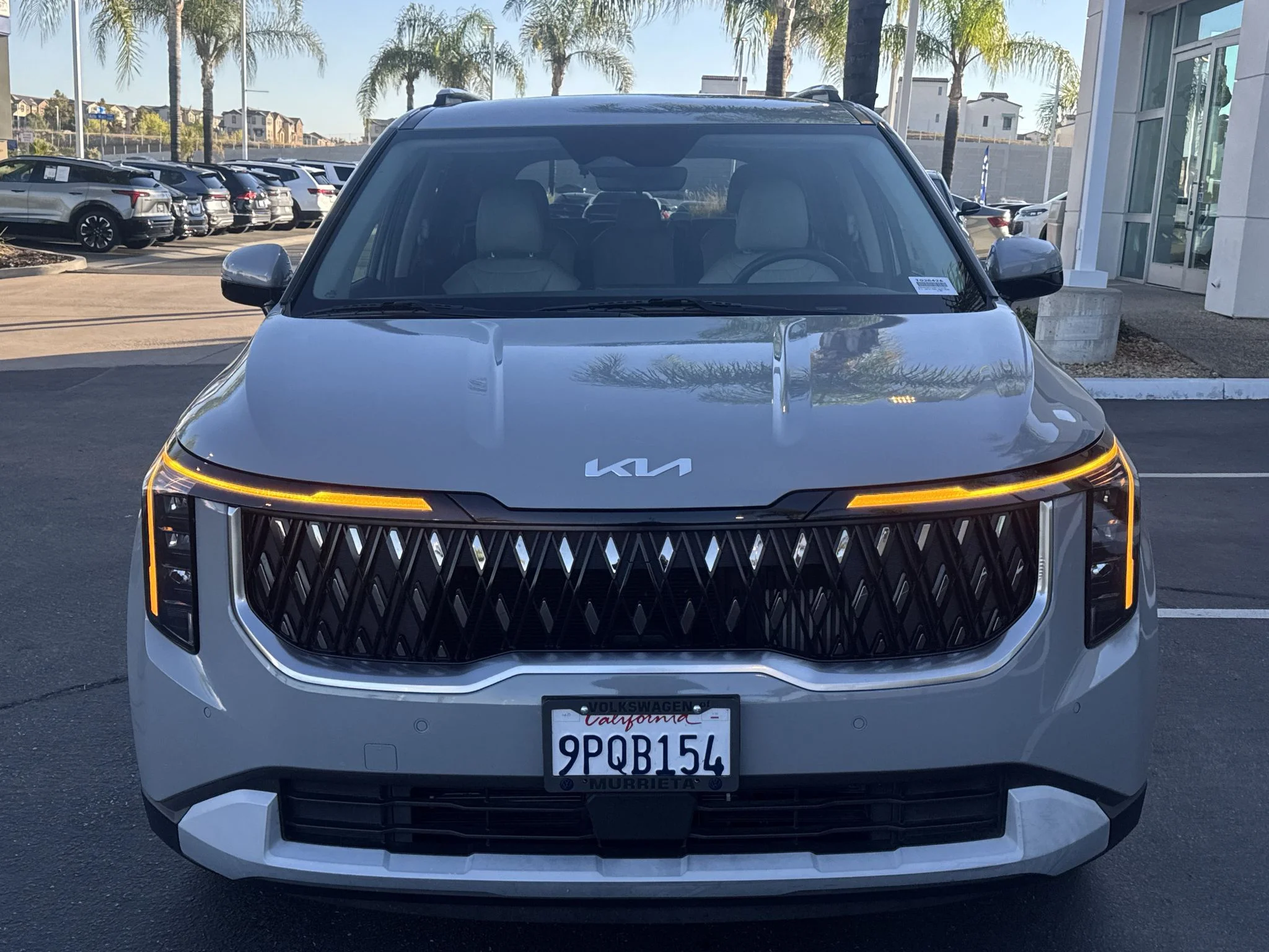 Used 2025 CERAMIC SILVER Kia EX image 2
