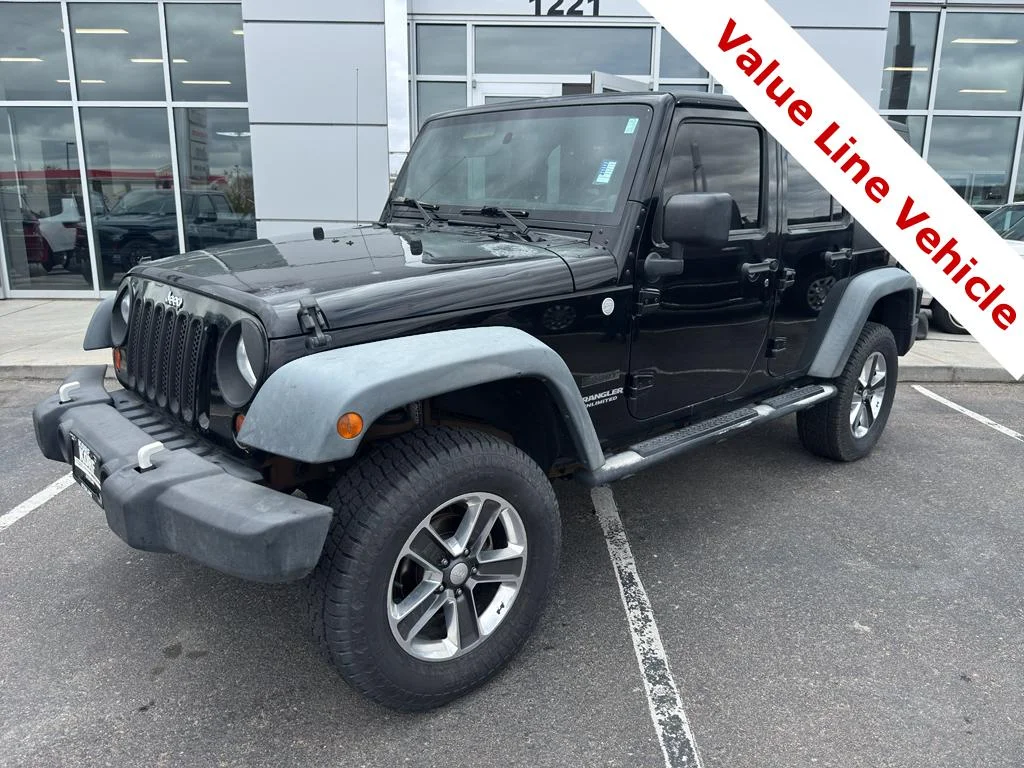 Used 2011 Black Clearcoat Jeep Sport image 1