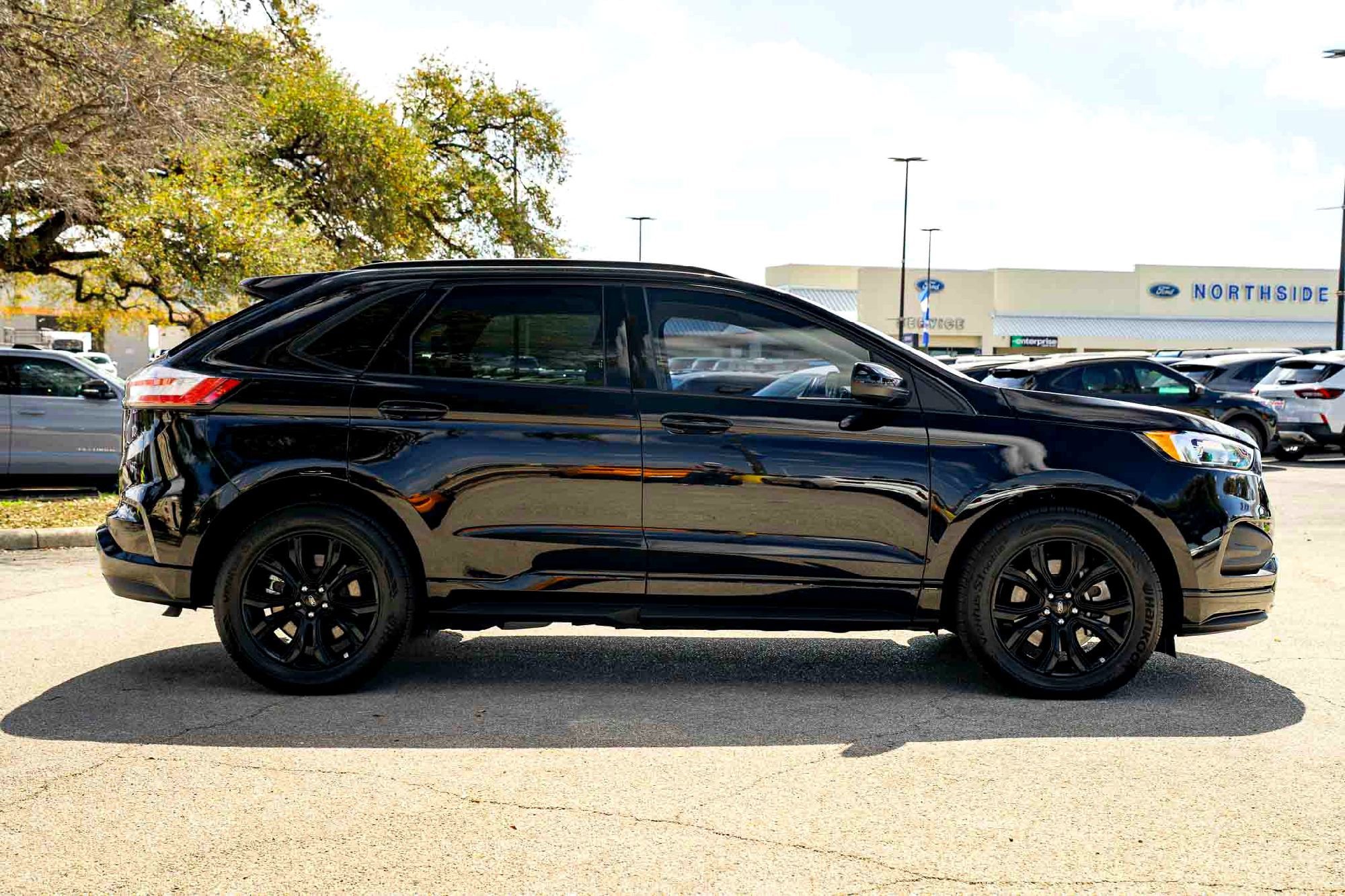 New 2024 Agate Black Metallic Ford SE image 4