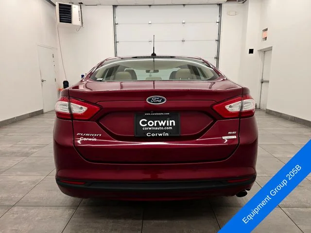 Used 2013 Ruby Red Metallic Ford SE image 4