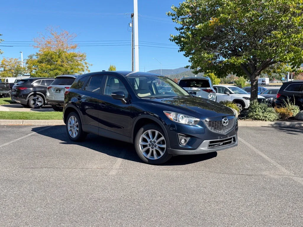 Used 2015 Blue Mazda Grand Touring image 1