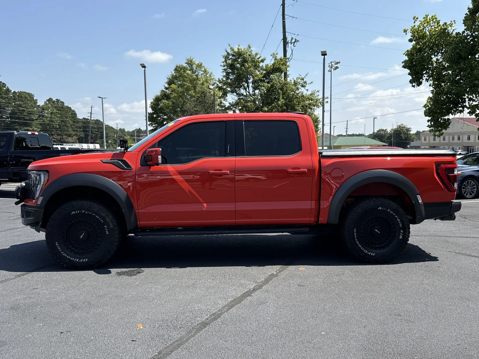 Certified Used 2023 Orange Metallic Ford Raptor image 14