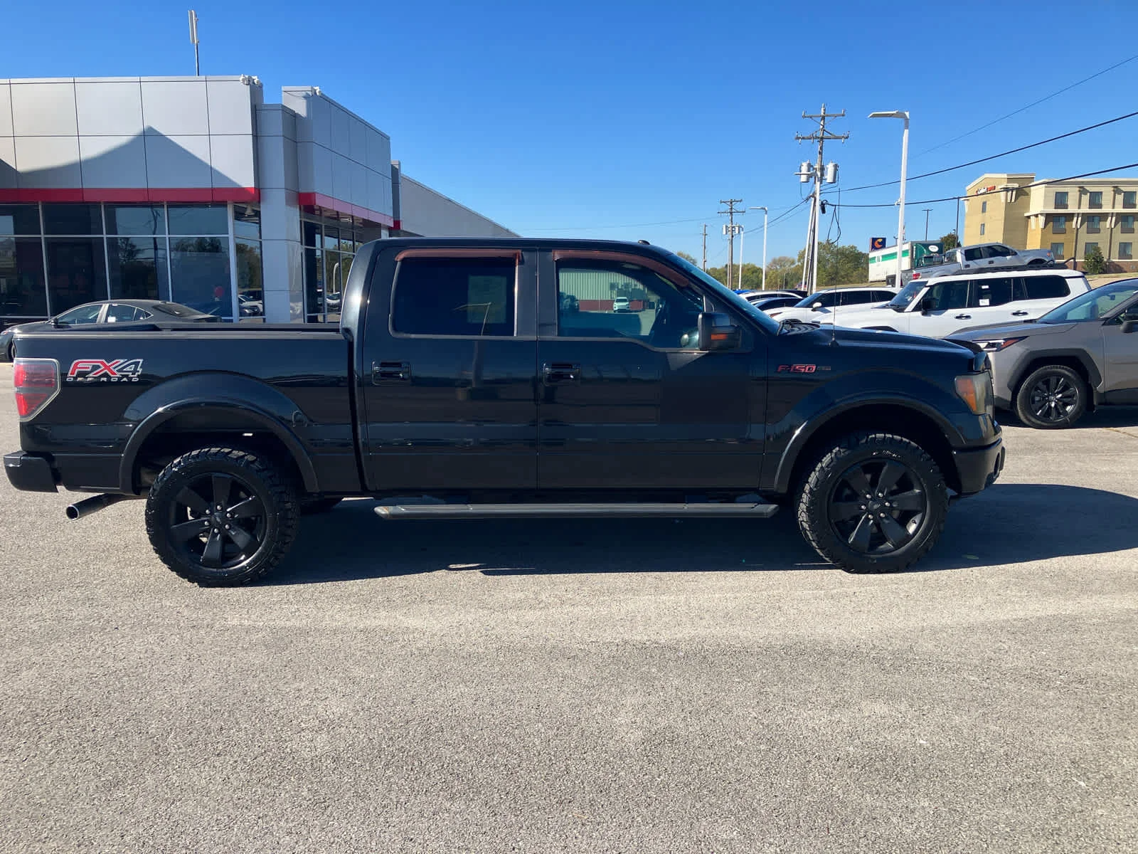Used 2012 Tuxedo Black Metallic Ford FX4 image 8