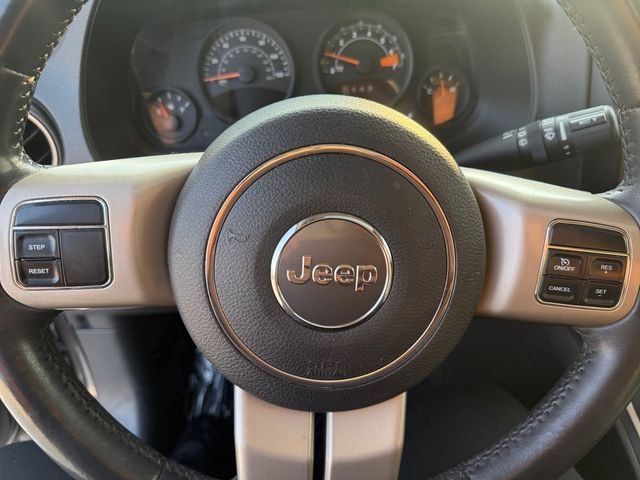 Used 2016 Granite Crystal Clearcoat Metallic Jeep Sport image 9