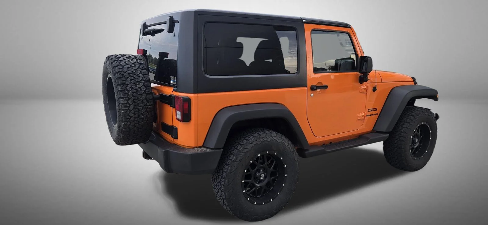 Used 2012 Orange Jeep Sport image 3