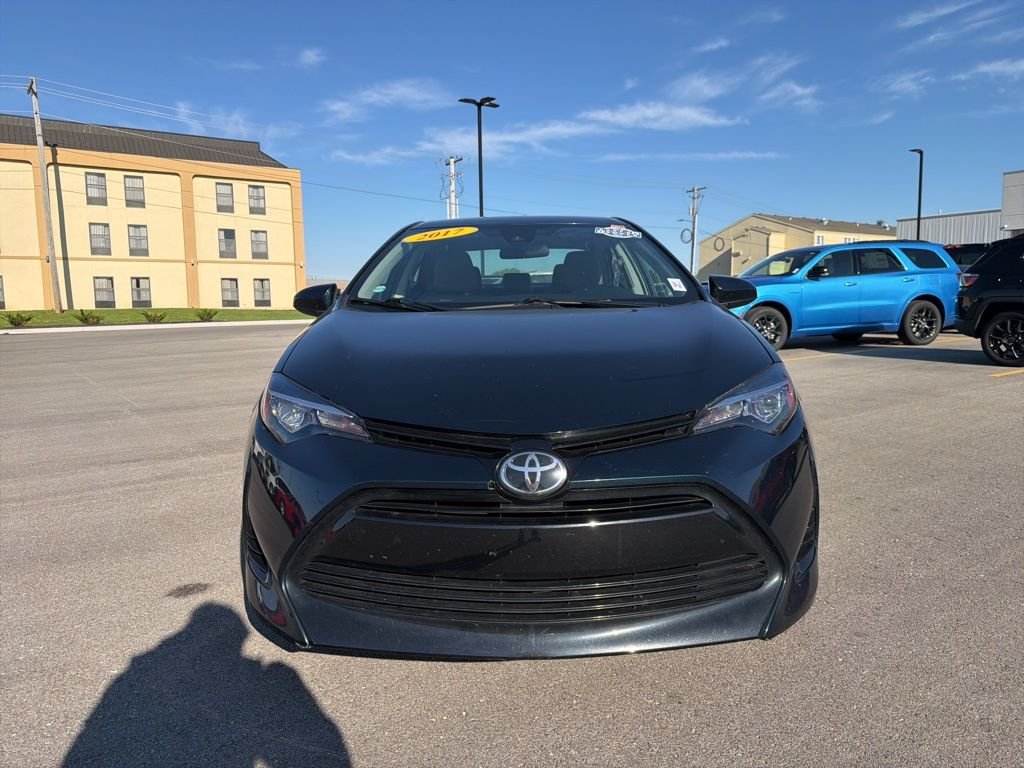 Used 2017 Toyota Corolla LE with VIN 2T1BURHE8HC863597 for sale in Kansas City