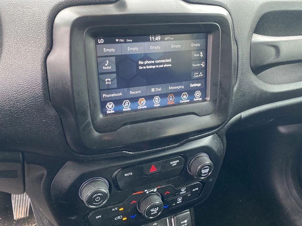 Used 2018 Omaha Orange Jeep Sport image 4