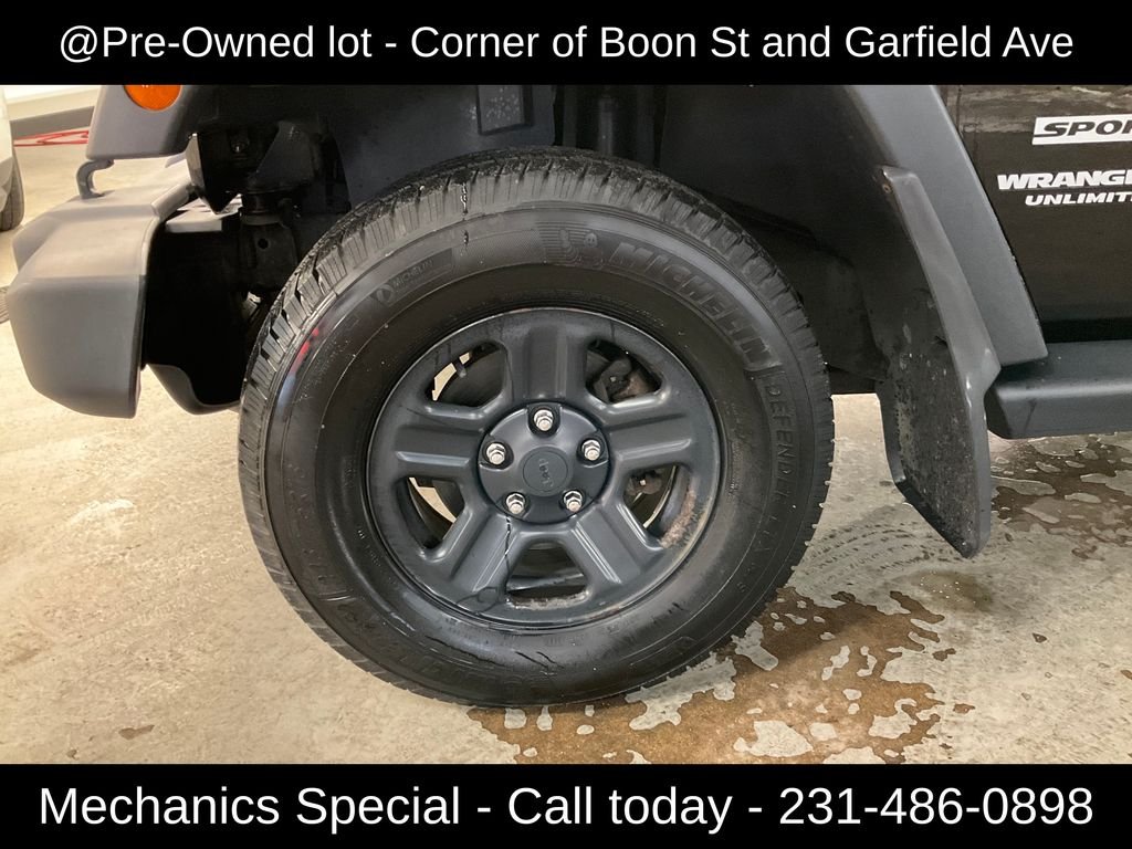 Used 2015 Black Jeep Unlimited Sport image 10
